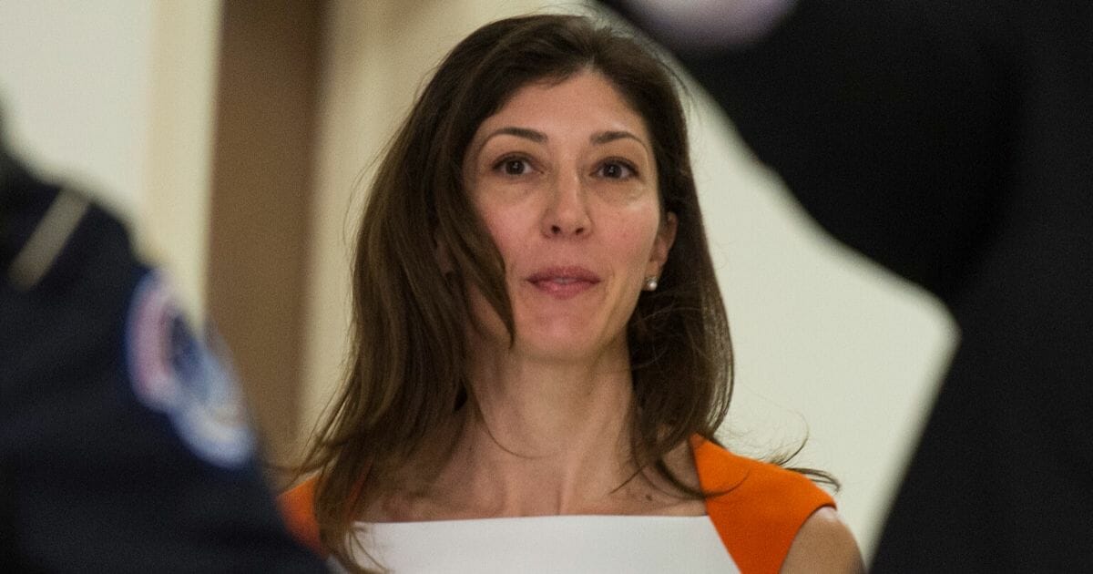 Former FBI attorney Lisa Page is pictured in a file photo heading to an appearance before the House Judiciary and Oversight committees on Capitol Hill in Washington in December 2018.