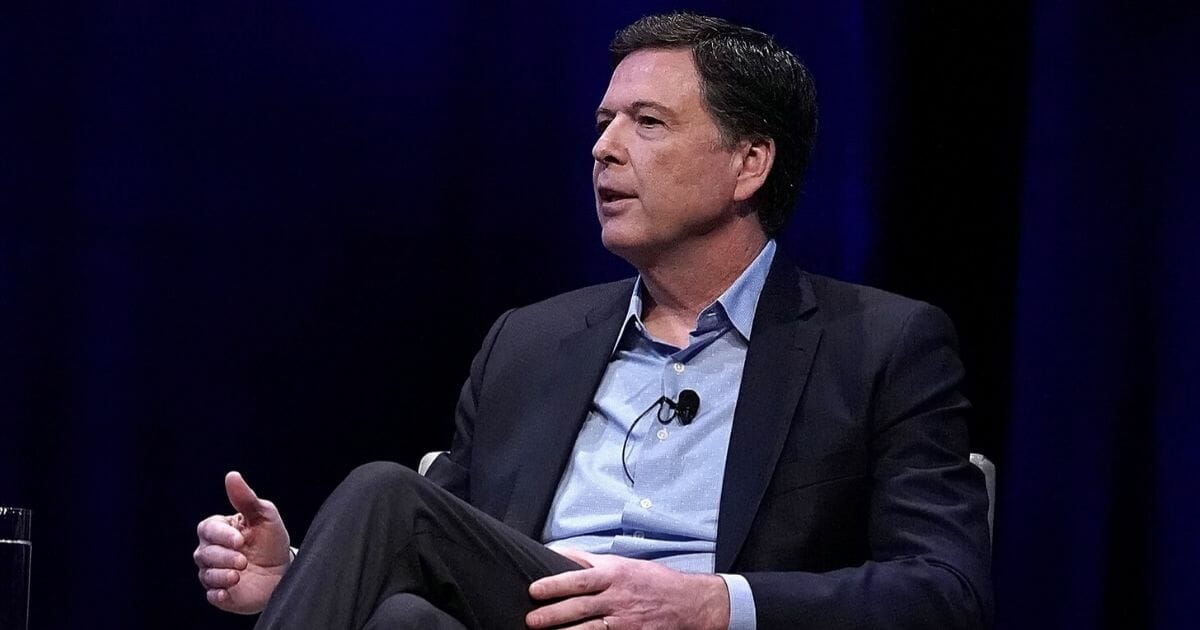 Former FBI Director James Comey is pictured in a 2018 file photo discussing his book "A Higher Loyalty" at George Washington University in Washington.