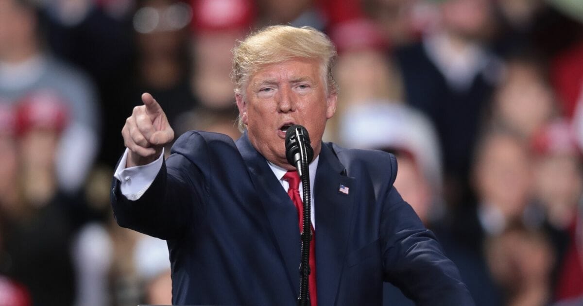 President Donald Trump addresses his impeachment during a "Merry Christmas" rally at the Kellogg Arena on Dec. 18, 2019 in Battle Creek, Michigan.