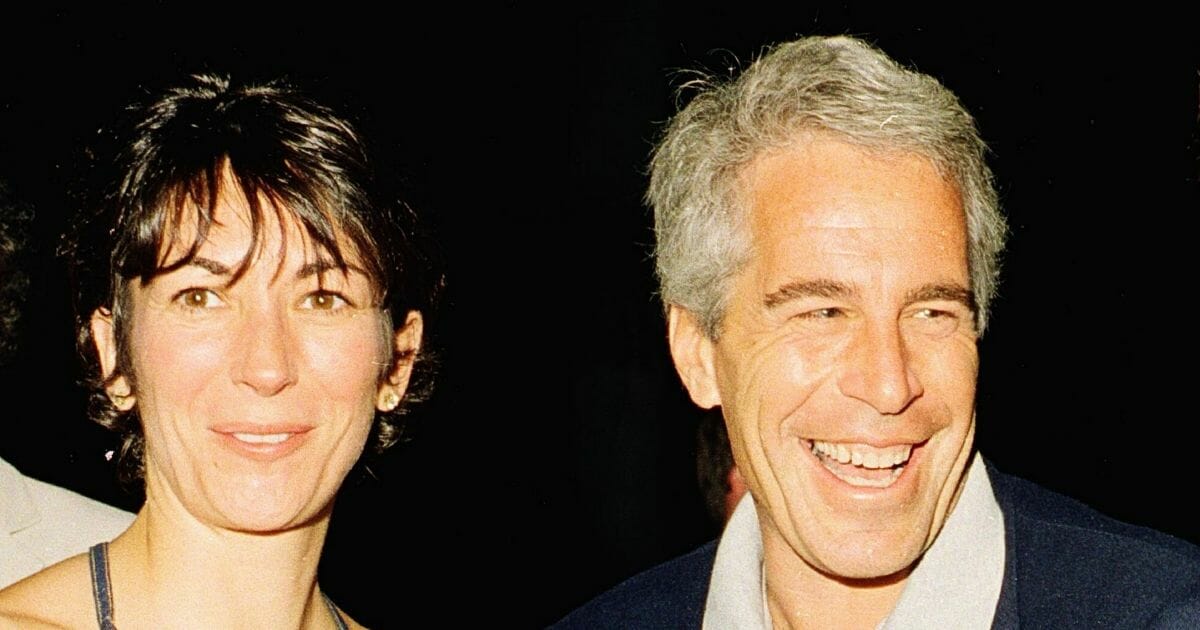 Former financier and convicted sex offender Jeffrey Epstein and his associate Ghislaine Maxwell pose for a portrait during a party in Palm Beach, Florida on Feb. 12, 2000.