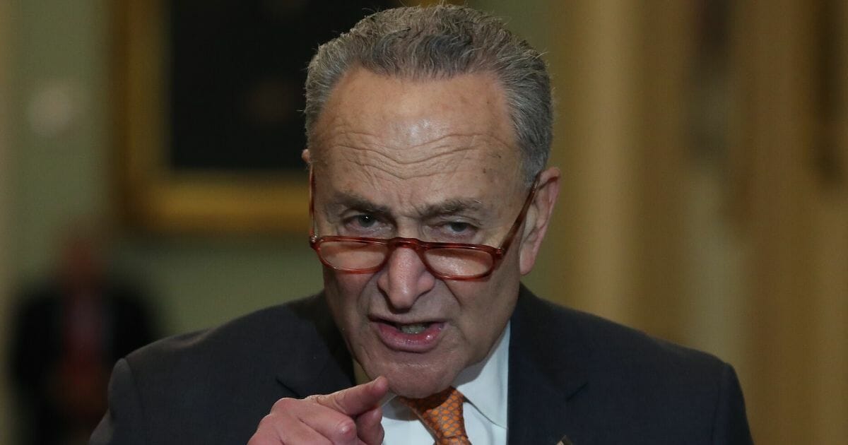 Senate Minority Leader Charles Schumer speaks to the media after attending the Senate Democrats' policy luncheon on Capitol Hill on Dec. 17, 2019 in Washington, D.C.