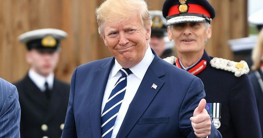 President Donald Trump gives a thumbs up to the camera during his June trip to England to commemorate the 75th anniversary of the D-Day landing during World War II.