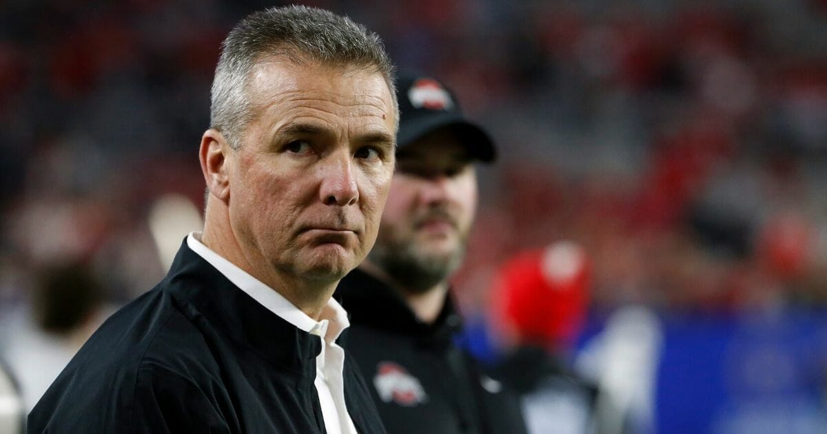 Former Ohio State Buckeyes head coach Urban Meyer looks on during the College Football Playoff Semifinal between the Ohio State Buckeyes and the Clemson Tigers at the PlayStation Fiesta Bowl at State Farm Stadium on Dec. 28, 2019, in Glendale, Arizona.