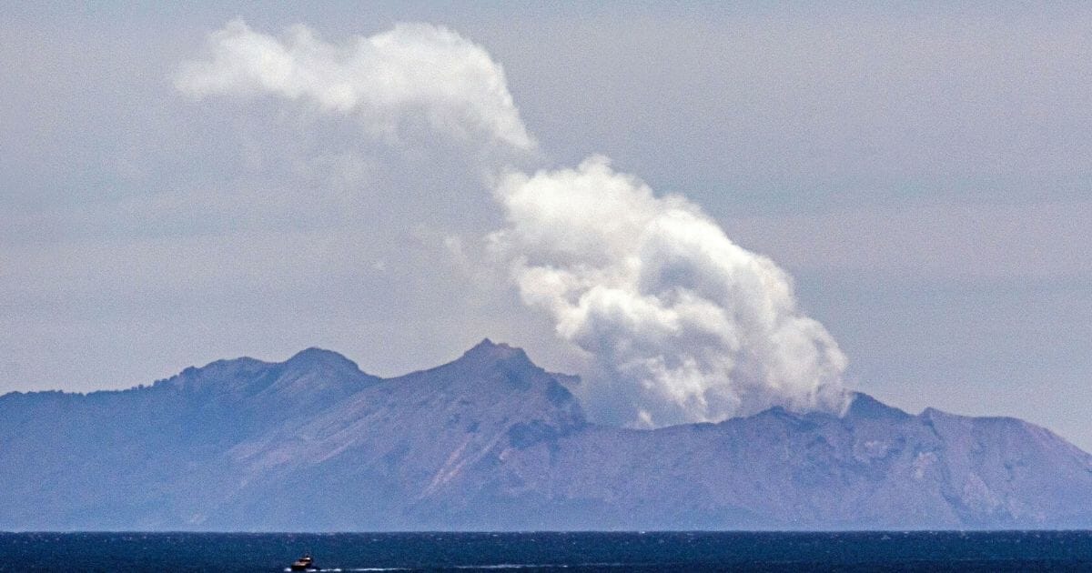 Steam rises from the White Island volcano following the December 9 volcanic eruption, in Whakatane on Dec. 11, 2019.