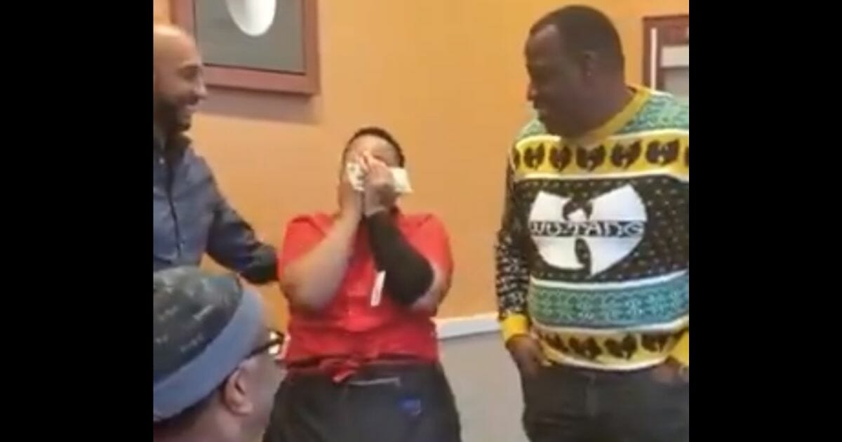 IHOP waitress Angelica Alicea reacts after receiving a $1,200 tip.