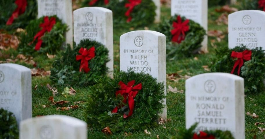 More than 50,000 anticipated volunteers placed remembrance wreaths on the nearly 245,000 headstones in Arlington National Cemetery on Dec. 17, 2016 in Arlington, Virginia.