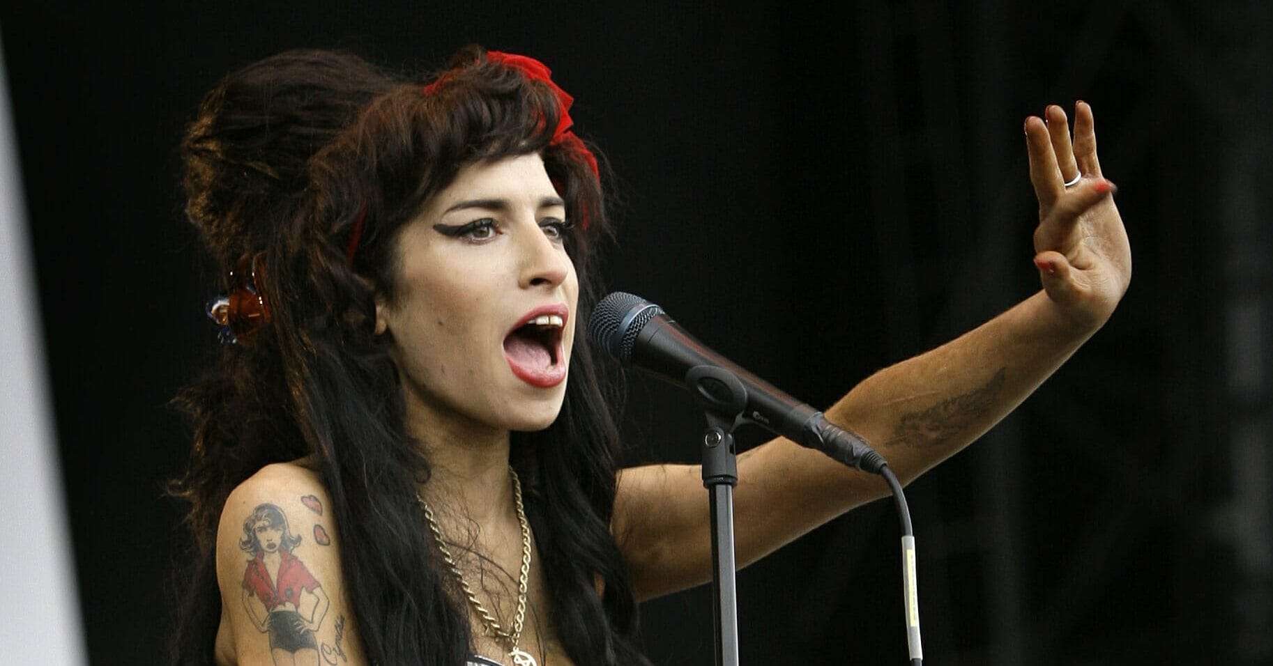 Amy Winehouse performs at the V Festival in Chelmsford, Essex in England on Aug. 17, 2008.