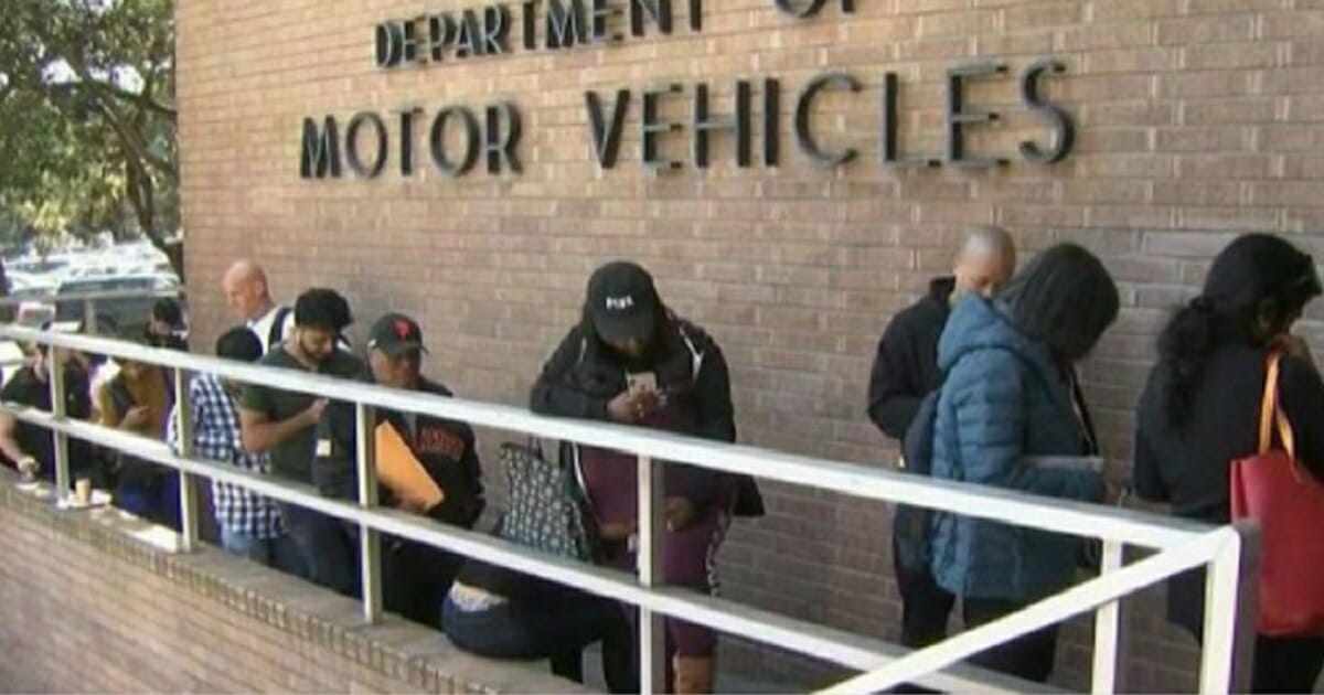 Motorists in line at a California Department of Motor Vehilcle office.