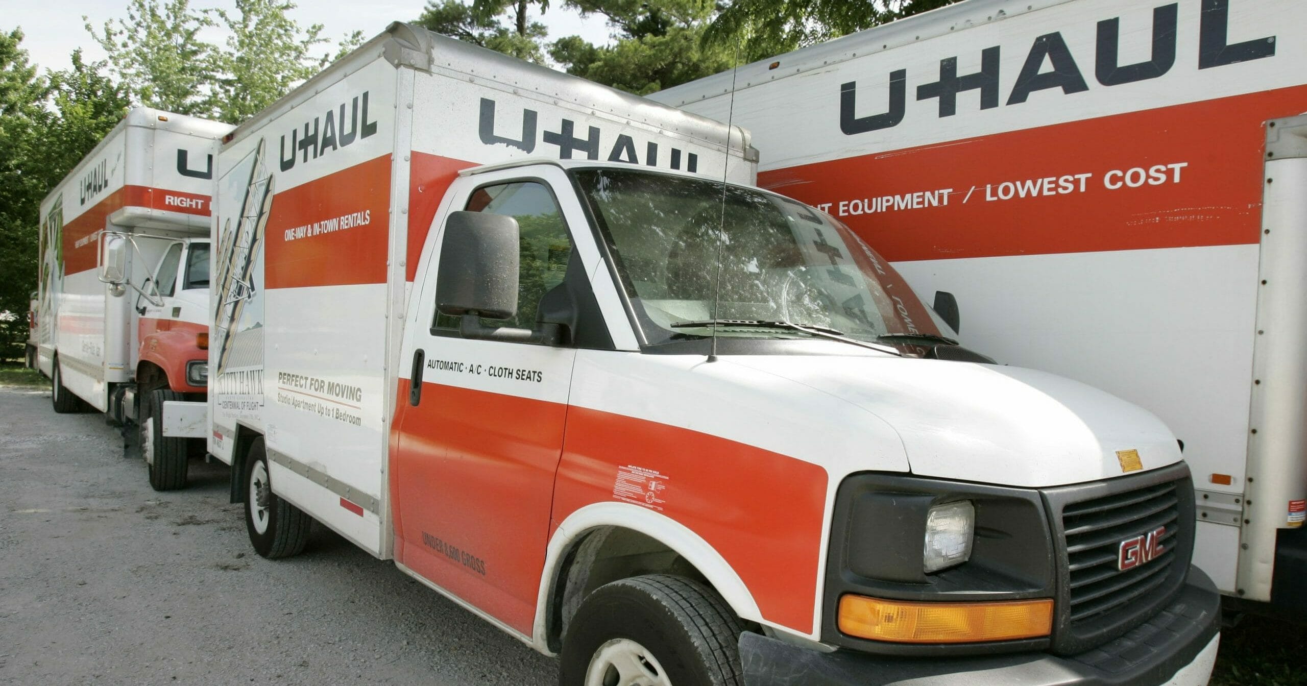 In this June 14, 2006, file photo, U-Haul trucks sit on a dealer lot in Des Moines, Iowa. U-Haul has a New Year's resolution: cut down on hiring people who smoke. The moving company said that it won't hire nicotine users in the 21 states where it is legal to do so, saying that it wants to ensure a "healthier workforce." The new policy will start Feb. 1, 2020, and won't apply to those hired before then.