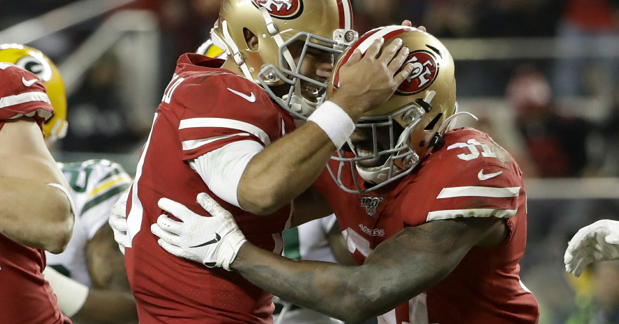 San Francisco 49ers running back Raheem Mostert, right, celebrates his touchdown with quarterback Jimmy Garoppolo during the NFC championship game against the Green Bay Packers on, Jan. 19, 2020, in Santa Clara, California.