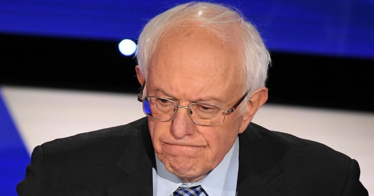 Democratic presidential candidate Sen. Bernie Sanders of Vermont scowls during a Democratic primary debate at the Drake University campus in Des Moines, Iowa, on Jan. 14, 2020
