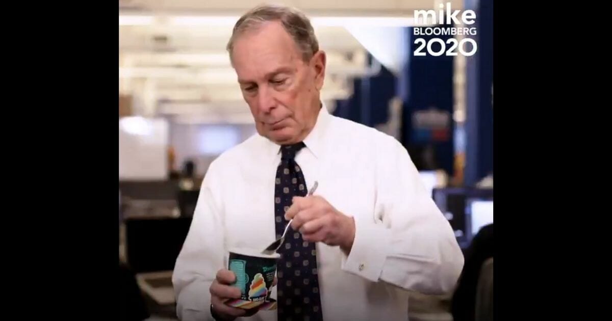 Democratic presidential candidate Michael Bloomberg digs into some Big Gay Ice Cream.