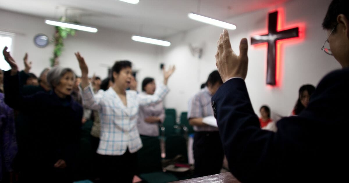 Members of the house church Xin Mingling meet for Sunday service May 15, 2011, in Beijing, China.