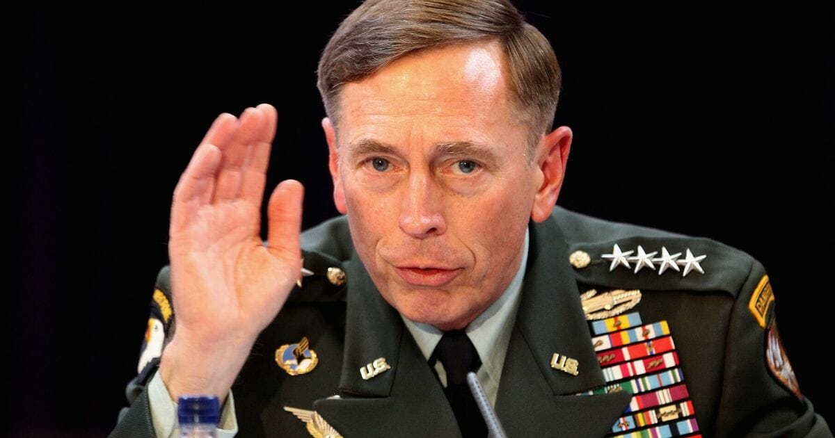 Then-General David Petraeus speaks at the Royal United Services Institute on Oct. 15, 2010, in London, England.