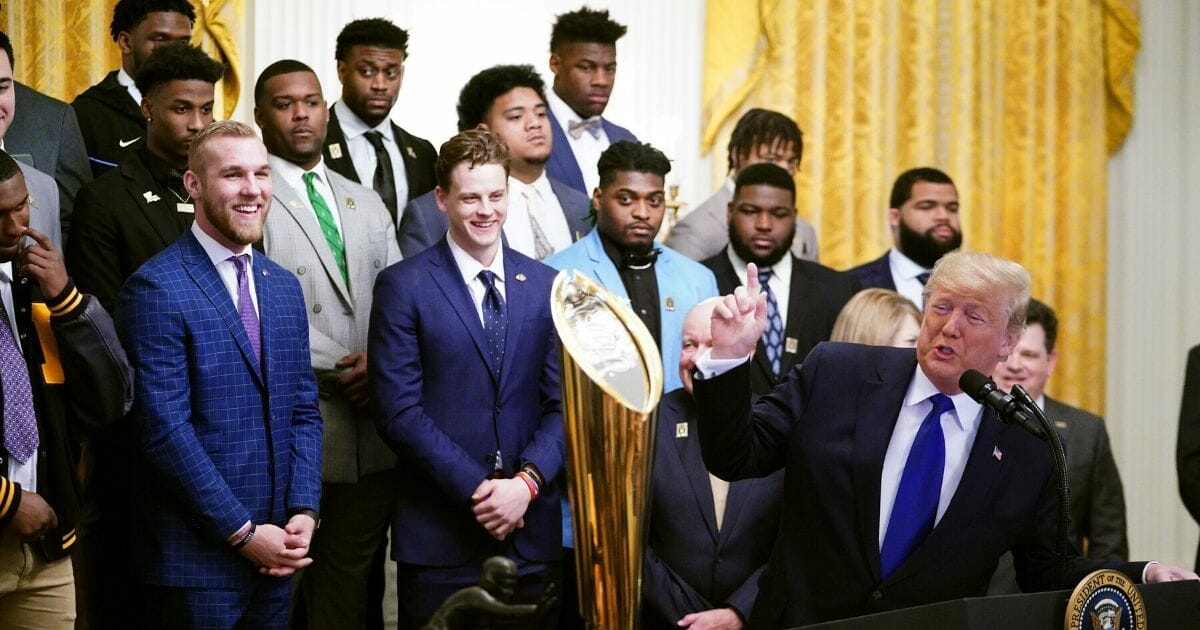 President Donald Trump takes part in an event honoring the 2019 college football national champions, the Louisiana State University Tigers, in the East Room of the White House in Washington, D.C., on Jan. 17, 2020.