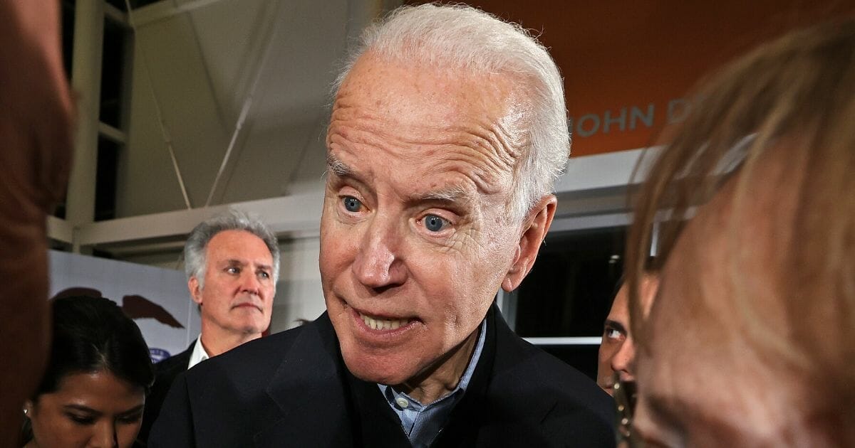 Democratic presidential candidate and former Vice President Joe Biden talks to people who came to his campaign event at the FFA Enrichment Center in Ankeny, Iowa, on Jan. 25, 2020.