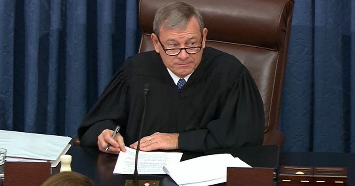 In this screengrab taken from a Senate Television webcast, Supreme Court Chief Justice John Roberts presides over impeachment proceedings against U.S. President Donald Trump in the Senate at the U.S. Capitol on January 21, 2020 in Washington, DC.