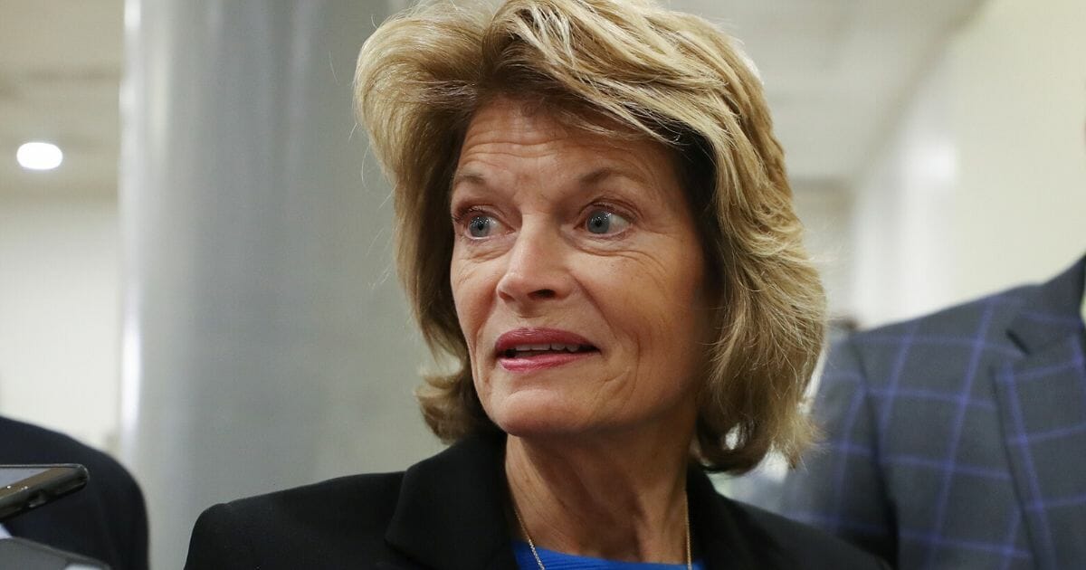 Republican Sen. Lisa Murkowski of Alaska speaks to reporters as she arrives for the continuation of the Senate impeachment trial of President Donald Trump at the U.S. Capitol in Washington on Jan. 29, 2020.