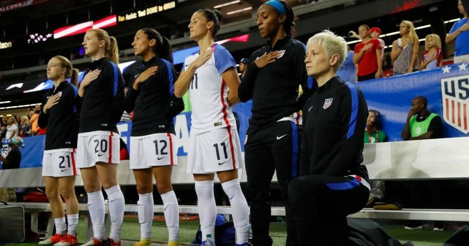 Womens football star Megan Rapinoe kneels during national 