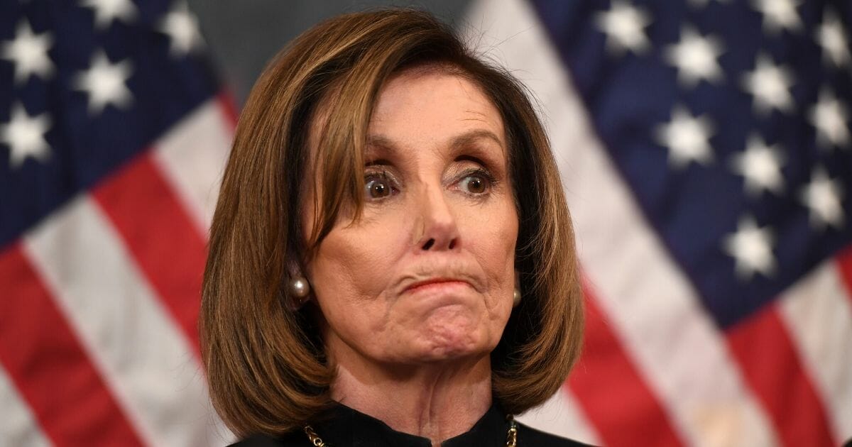 Speaker of the House Nancy Pelosi holds a news conference after the House passed articles of impeachment against President Donald Trump at the U.S. Capitol in Washington, D.C., on Dec. 18, 2019.
