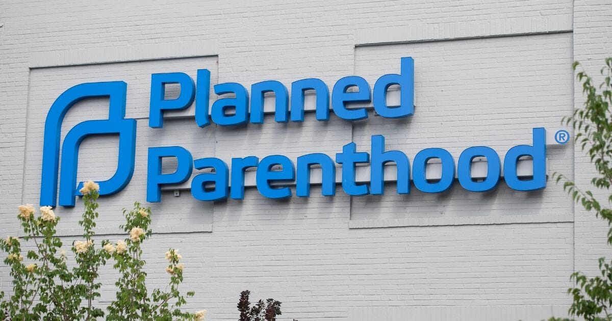 The logo of Planned Parenthood is seen outside the Planned Parenthood Reproductive Health Services Center in St. Louis, Missouri, on May 30, 2019.