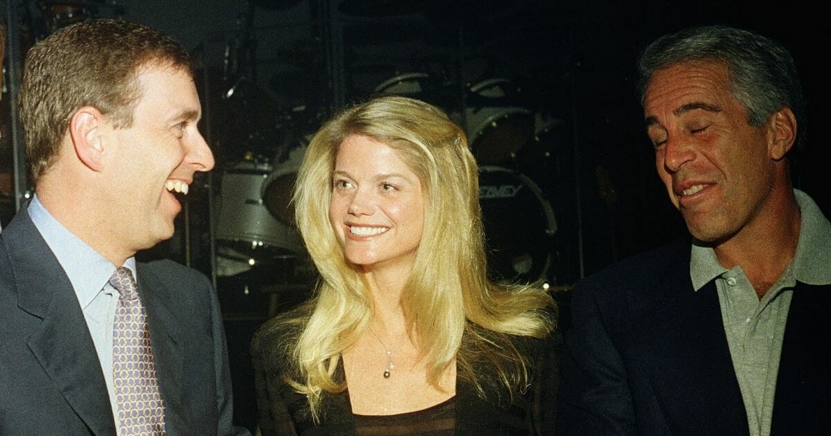 Prince Andrew, left, talks with Jeffrey Epstein, right, and Gwendolyn Beck during a party at the Mar-a-Lago Club in Palm Beach, Florida, on Feb. 12, 2000.