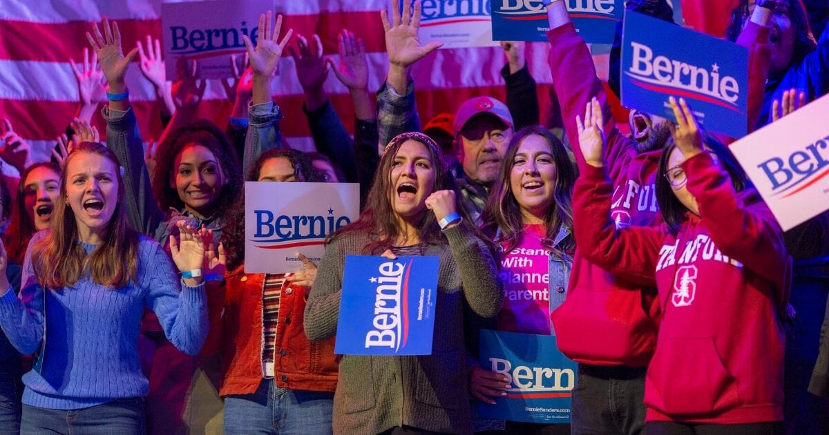 Supporters cheer for Sen. Bernie Sanders of Vermont as the Democratic presidential candidate holds a rally in Rancho Mirage California, on Dec. 16, 2019.