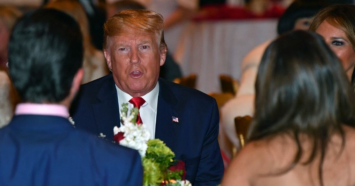 President Donald Trump attends a Christmas Eve dinner