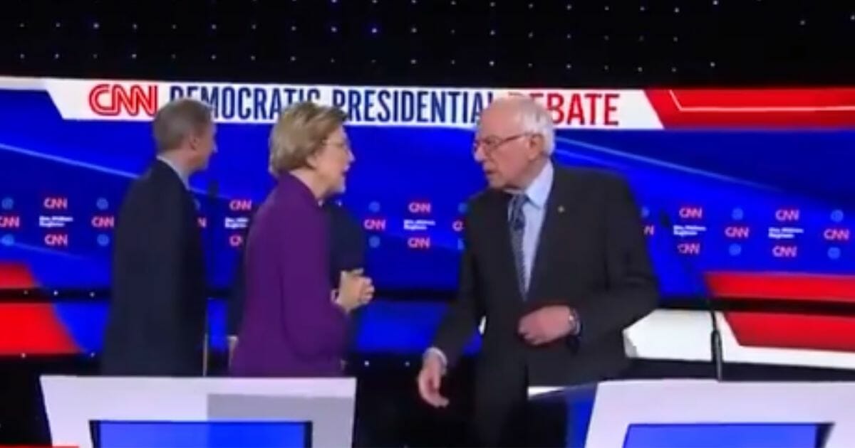 Elizabeth Warren and Bernie Sanders share tense words after a Democratic debate.