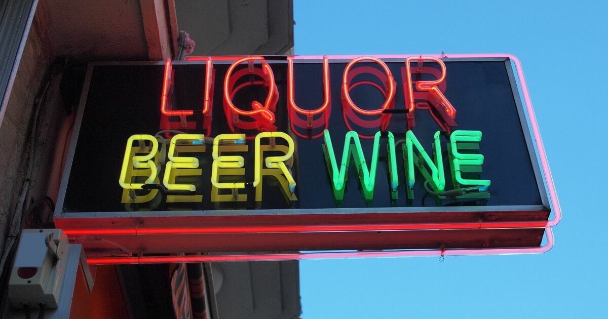A stock image of a liquor store sign is pictured above.