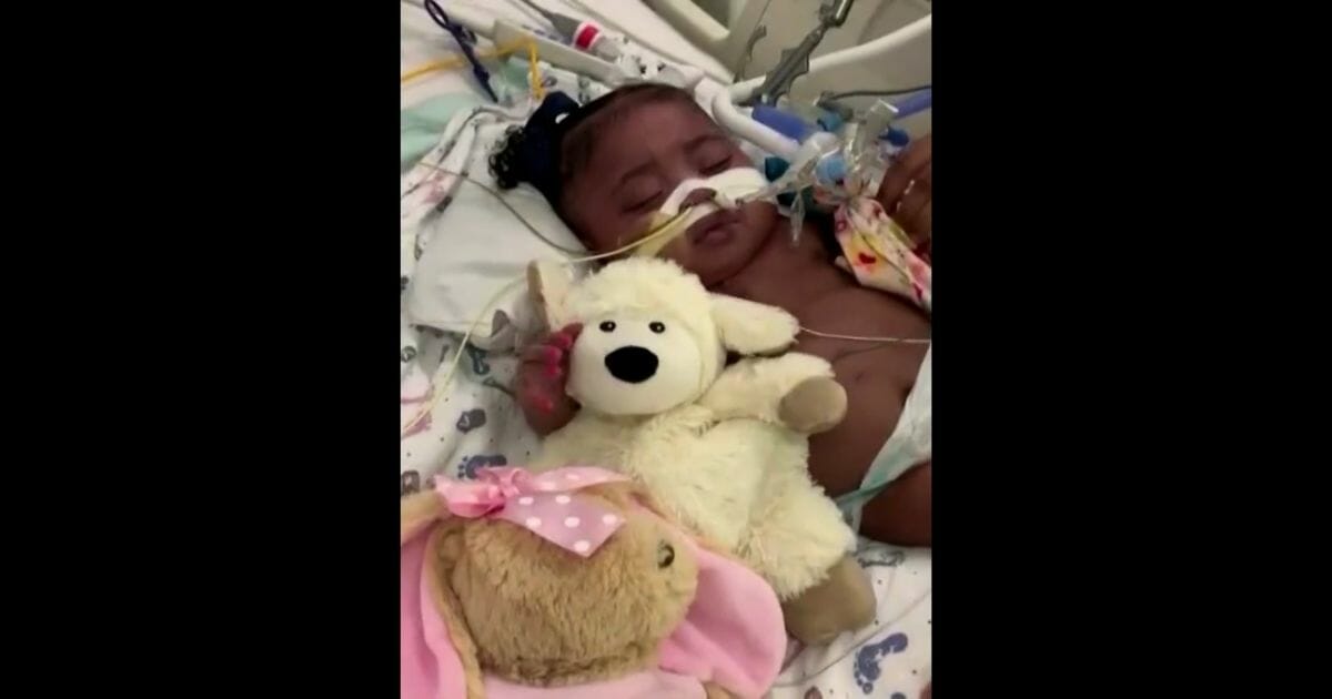 Tinslee Lewis, 11 months old, is still on life support in a Texas hospital thanks to an appeals court's reversal of a lower court ruling.