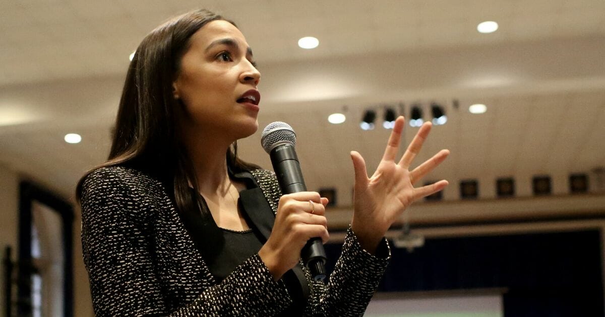 Rep. Alexandria Ocasio-Cortez told New York Magazine in a profile published Monday that, outside the United States, she and former Vice President Joe Biden would not even be in the same political party.