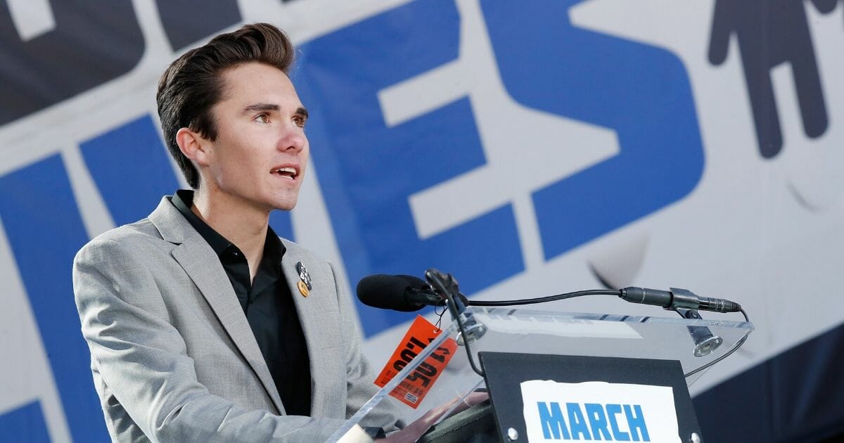 Anti-gun activist and then-Marjory Stoneman Douglas High School student David Hogg speaks onstage at the March For Our Lives anti-gun protest on March 24, 2018.