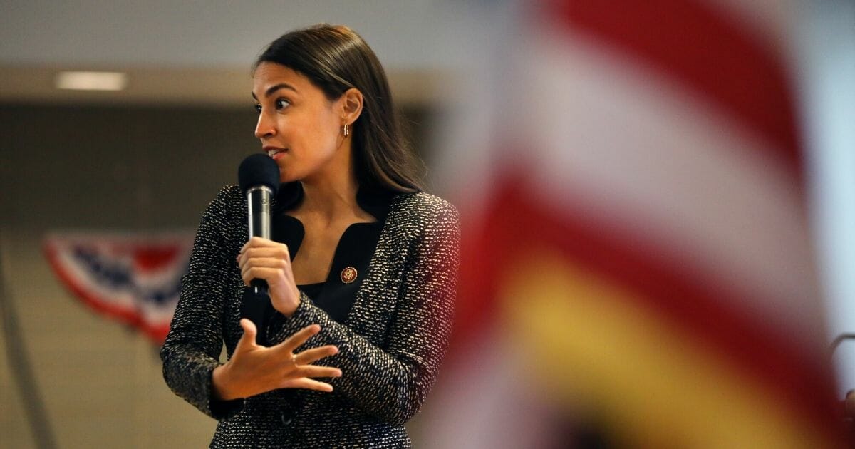 U.S. Rep. Alexandria Ocasio-Cortez speaks at a public housing town hall in New York City in August.