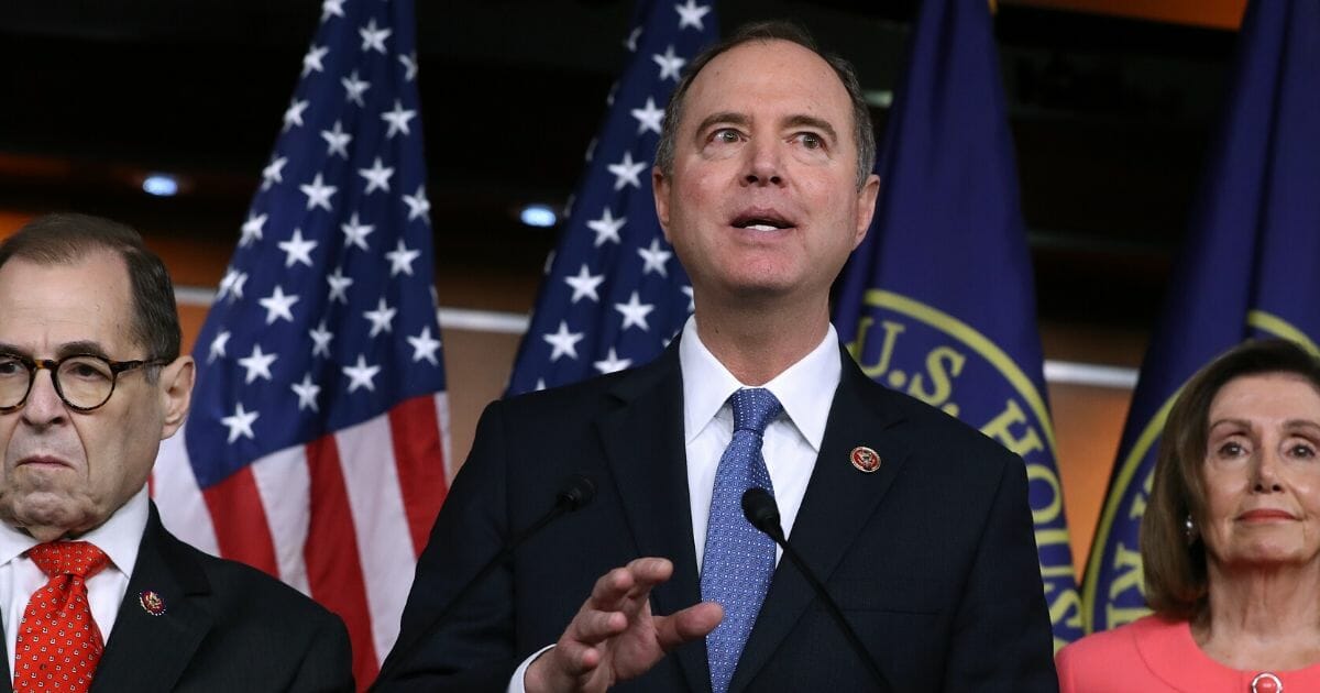 U.S. Rep. Adam Schiff adresses the media during a news conference, flanked by Rep. Jerrold Nadler, left, and House Speaker Nancy Pelosi.