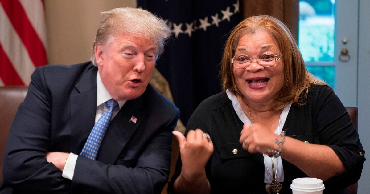 President Donald Trump responds to Dr. Alveda King, niece of Dr. Martin Luther King Jr., during a meeting with inner-city pastors at the White House in Washington, D.C. on Aug. 1, 2018.