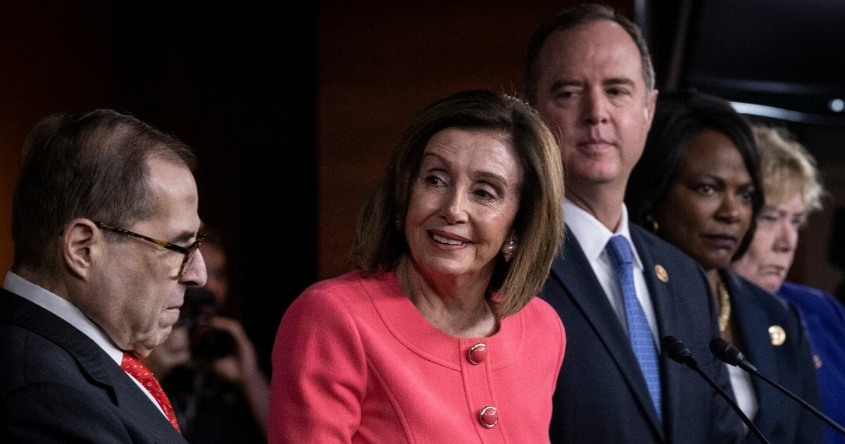 New York Rep. Jerry Nadler, Speaker of the House Nancy Pelosi, California Rep. Adam Schiff, Florida Rep. Val Demings and California Rep. Zoe Lofgren attend a news conference to announce the House impeachment managers on Jan. 15, 2020, in Washington, D.C.