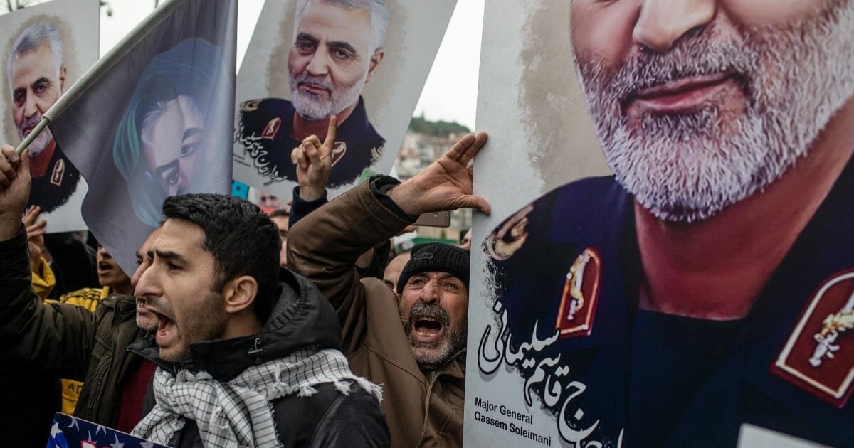 Demonstrators carry banners of slain Iranian Gen. Qassem Soleimani in Istanbul, Turkey, after Soleimani's Jan. 3 death in a U.S. drone strike in Baghdad.
