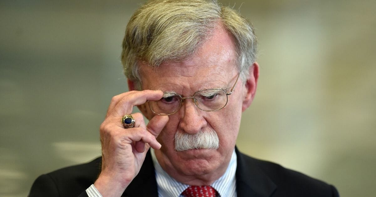 National Security Advisor John Bolton answers questions from the media after his meeting with the president of Belarus in Minsk on Aug. 29, 2019.