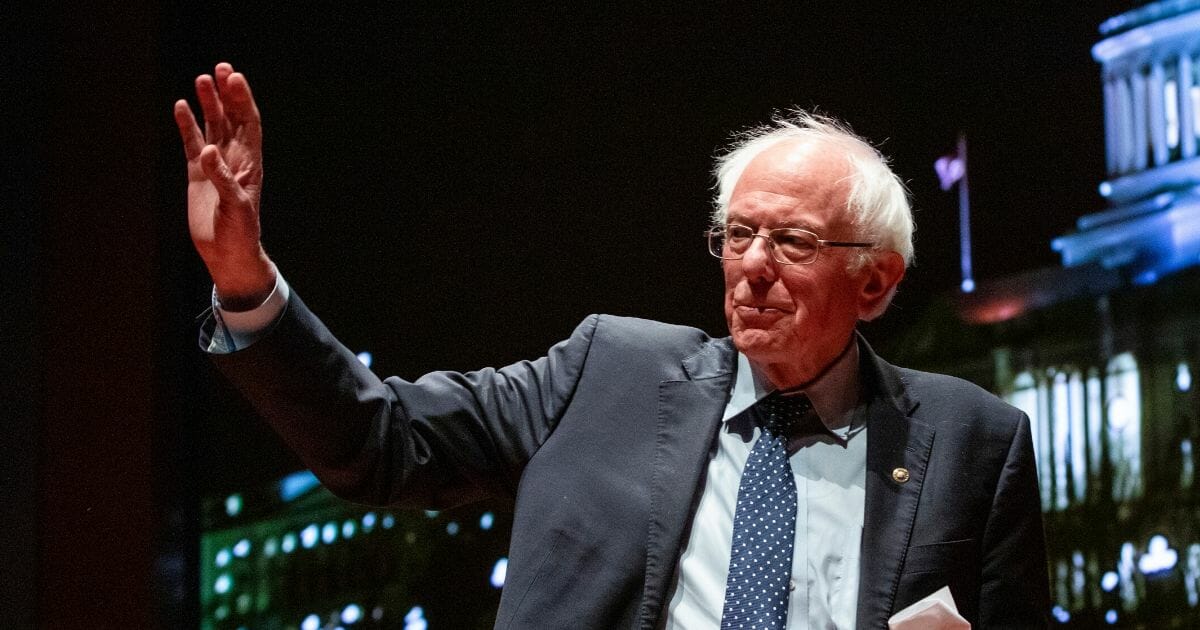 Democratic presidential candidate Sen. Bernie Sanders of Vermont leaves a roundtable discussion at the U.S. Capitol on strategies to combat the widespread contamination of America's drinking water.