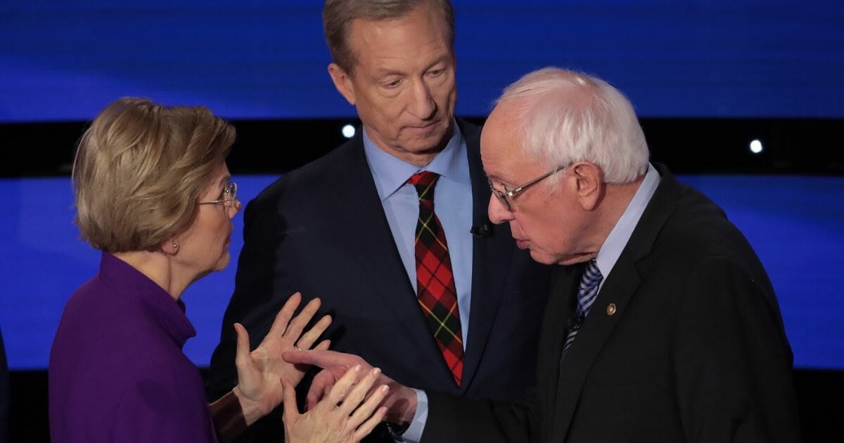 Following the Democratic presidential primary debate on Jan. 14, Massachusetts Sen. Elizabeth Warren, left, appeared to refuse to shake hands with Sen. Bernie Sanders of Vermont, right.