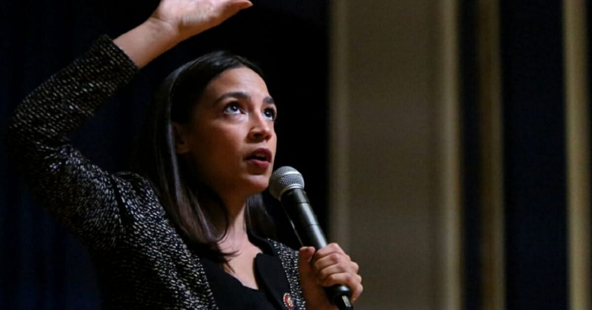 Rep. Alexandria Ocasio-Cortez speaks during a Green New Deal for Public Housing Town Hall on Dec. 14 in the Queens borough of New York City.