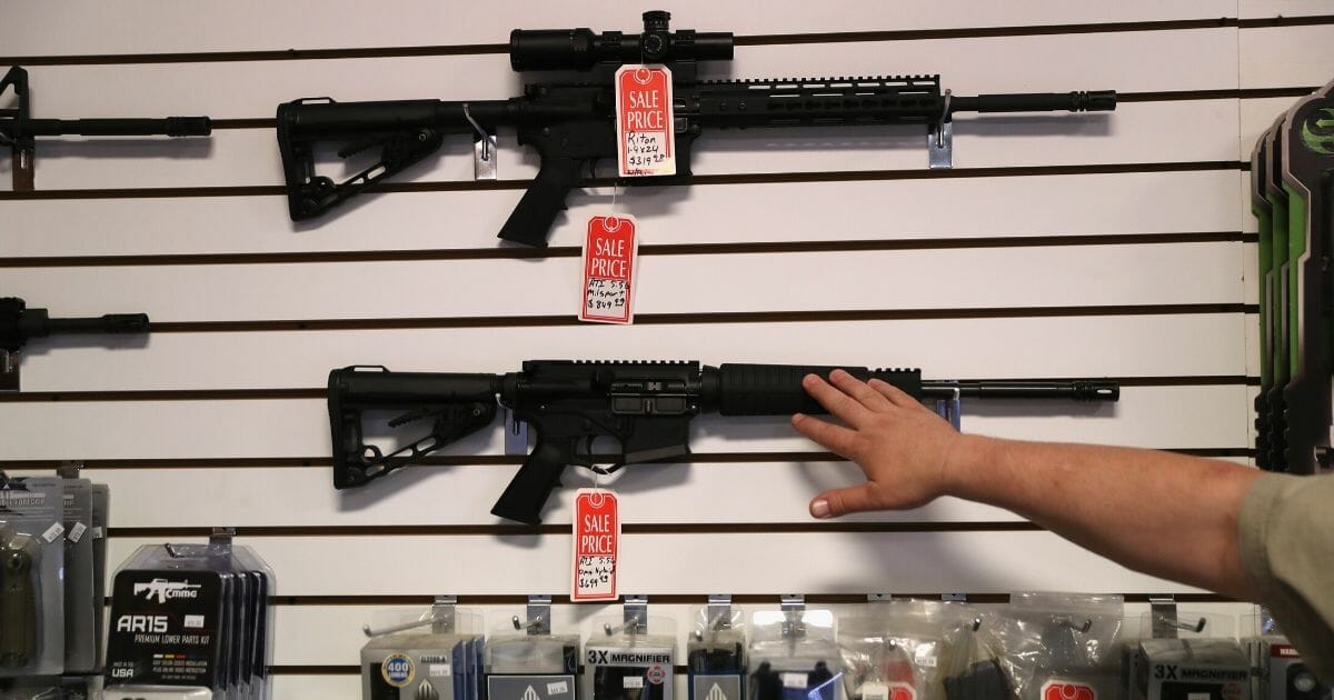 AR-15 rifles are displayed for sale at Sarge's Sidearms in Benson, Arizona, on Sept. 29, 2016.