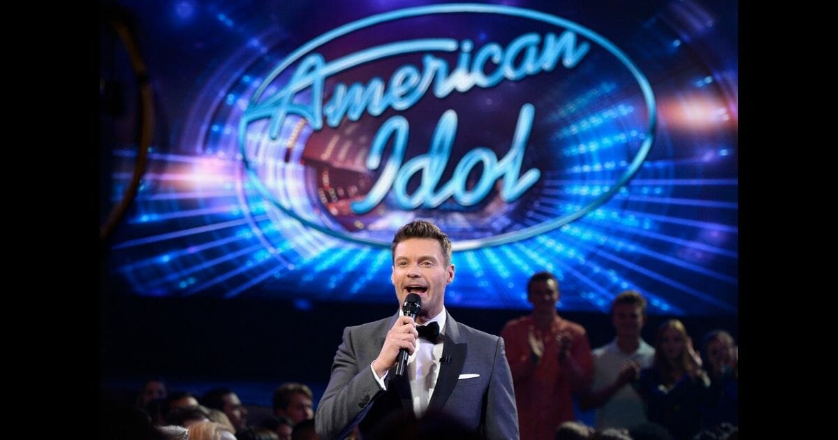 "American Idol" host Ryan Seacrest speaks in the audience during the show's Season 15 finale April 7, 2016, at the Dolby Theatre in Hollywood, California.