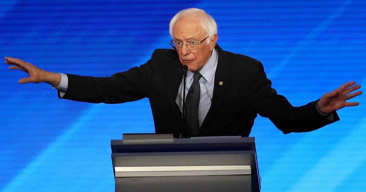 Democratic presidential candidate Sen. Bernie Sanders of Vermont makes a point during a primary debate in the Sullivan Arena at St. Anselm College in Manchester, New Hampshire, on Feb. 7, 2020.