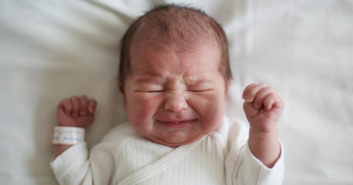 A stock photo of a newborn baby is seen in a maternity ward.