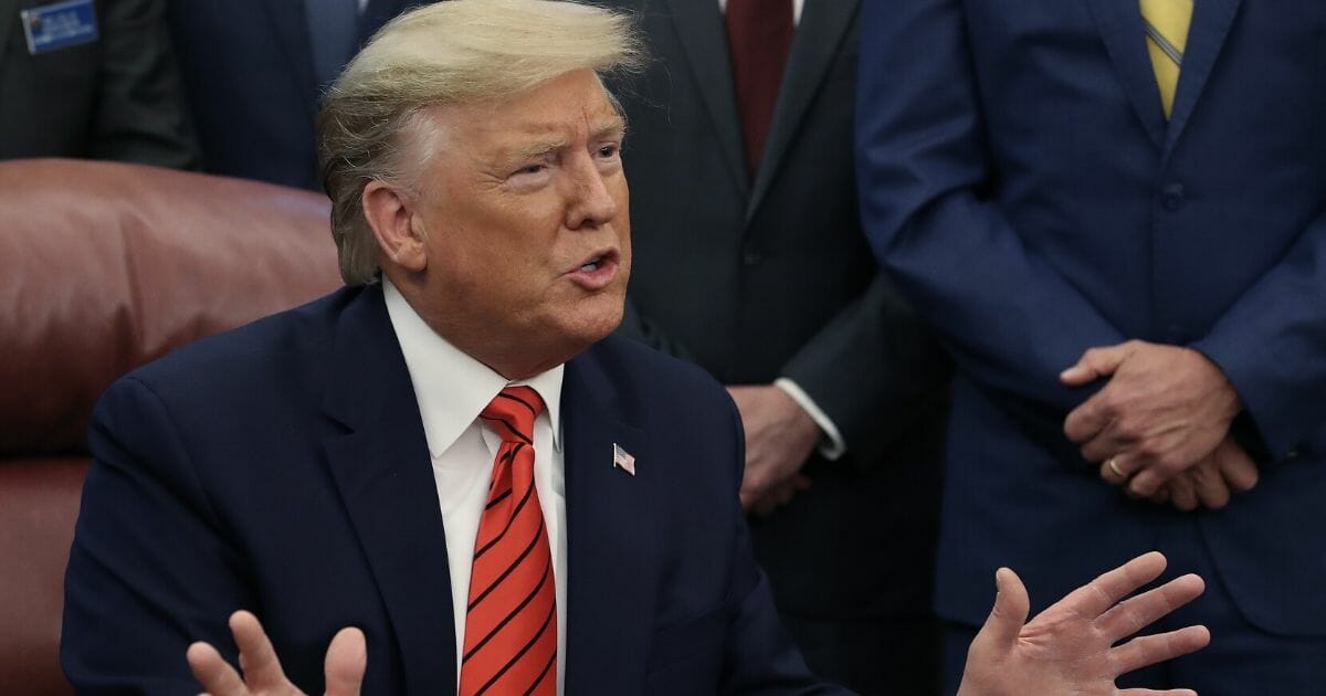 President Donald Trump speaks to reporters on the topic of Roger Stone, House Intelligence Committee Chairman Adam Schiff (D-California) and 2020 presidential candidates at the White House on Feb. 11, 2020, in Washington, D.C.