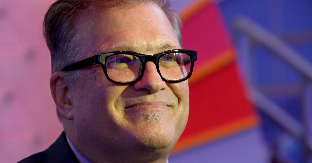 Actor/comedian Drew Carey speaks to an interviewer during the Global Gaming Expo at the Sands Expo and Convention Center on Oct. 10, 2018, in Las Vegas, Nevada.