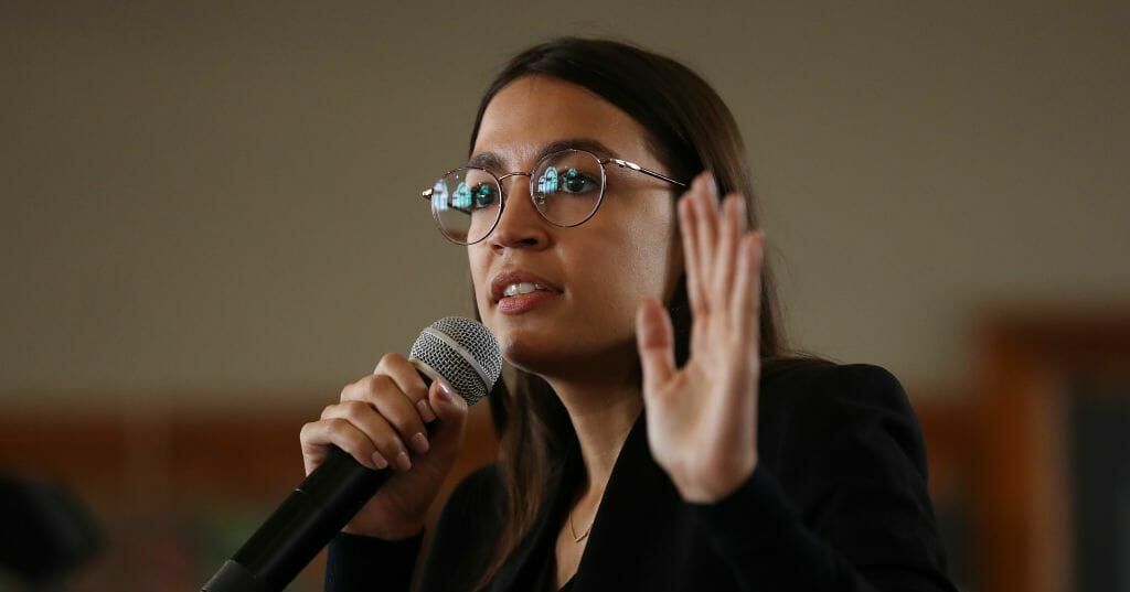 Democratic Rep. Alexandria Ocasio-Cortez of New York speaks during a campaign event with Democratic presidential candidate Sen. Bernie Sanders of Vermont on Jan. 26, 2020, in Perry, Iowa.