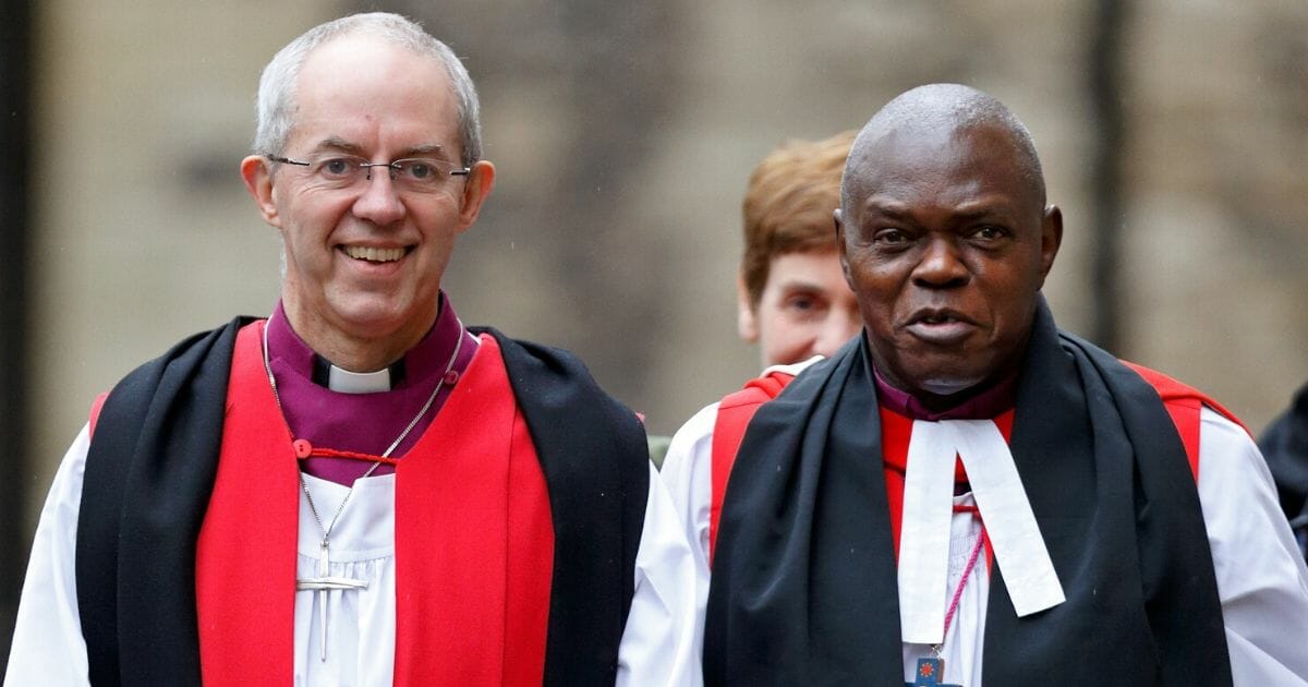 Justin Welby, archbishop of Canterbury, left, and Dr. John Sentamu, archbishop of York, attend the Inauguration of the Tenth General Synod of the Church of England at Church House on Nov. 24, 2015, in London, England.